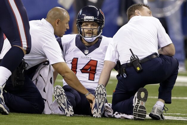 Houston Texans quarterback Ryan Fitzpatrick (14) is treated on the field after being injured during the first half of an NFL football game against the Indianapolis Colts in Indianapolis, Sunday, Dec. 14, 2014. (AP Photo/Darron Cummings) Houston Texans quarterback Ryan Fitzpatrick (14) is treated on the field after being injured during the first half of an NFL football game against the Indianapolis Colts in Indianapolis, Sunday, Dec. 14, 2014. (AP Photo/Darron Cummings)