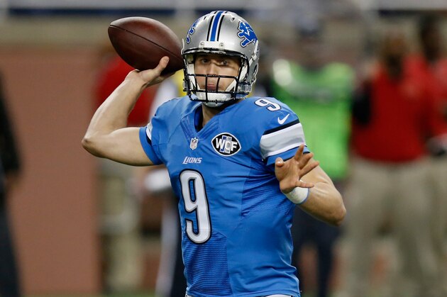 DETROIT, MI - DECEMBER 14: Matthew Stafford #9 of the Detroit Lions looks to throw a first quarter pass against the Minnesota Vikings at Ford Field on December 14, 2014 in Detroit, Michigan. (Photo by Gregory Shamus/Getty Images)