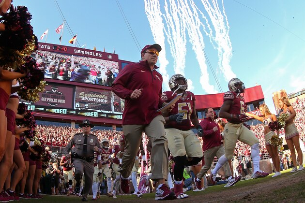TALLAHASSEE, FL - NOVEMBER 29: Head coach Jimbo Fisher of the Florida State Seminoles leads the team onto the field during a game against the Florida Gators   at Doak Campbell Stadium on November 29, 2014 in Tallahassee, Florida.  (Photo by Mike Ehrmann/Getty Images)