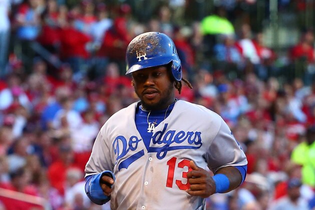 ST LOUIS, MO - OCTOBER 07:  Hanley Ramirez #13 of the Los Angeles Dodgers scores on an RBI single by Juan Uribe in the sixth inning against the St. Louis Cardinals in Game Four of the National League Divison Series at Busch Stadium on October 7, 2014 in St Louis, Missouri.  (Photo by Dilip Vishwanat/Getty Images)