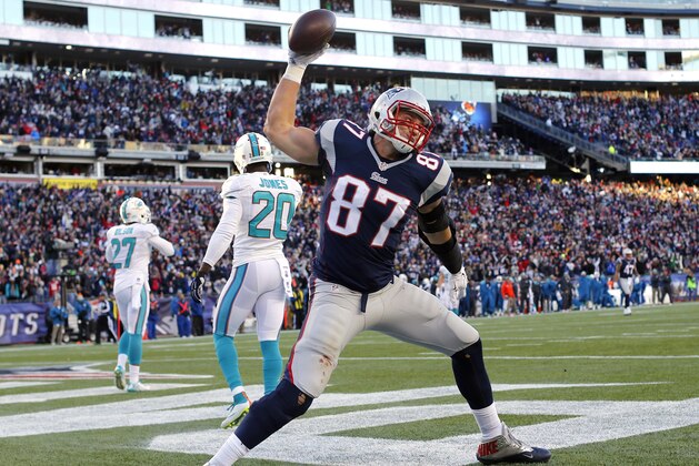 Dec 14, 2014; Foxborough, MA, USA; New England Patriots tight end Rob Gronkowski (87) celebrates after scoring a touchdown during the second half against the Miami Dolphins at Gillette Stadium. The Patriots won 41-13. Mandatory Credit: Winslow Townson-USA TODAY Sports