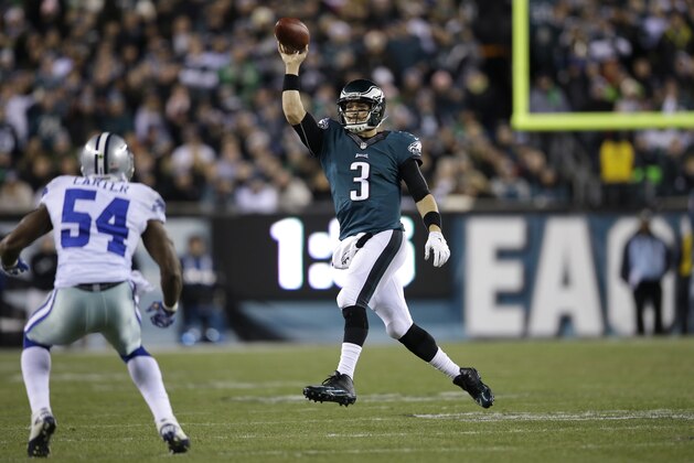 Philadelphia Eagles' Mark Sanchez passes during the first half of an NFL football game against the Dallas Cowboys, Sunday, Dec. 14, 2014, in Philadelphia. (AP Photo/Matt Rourke)