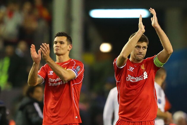 LIVERPOOL, ENGLAND - OCTOBER 22:  Steven Gerrard of Liverpool and Dejan Lovren (L) acknowledge the fans at the end of the UEFA Champions League Group B match between Liverpool and Real Madrid CF on October 22, 2014 in Liverpool, United Kingdom.  (Photo by Alex Livesey/Getty Images)