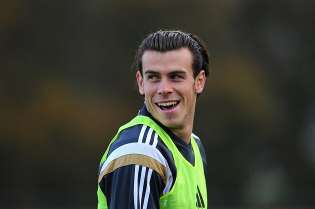 CARDIFF, WALES - NOVEMBER 15:  Wales player Gareth Bale raises a smile during Wales football training ahead of tomorrow's UEFA Euro 2016 qualifying match against Belguim on November 15, 2014 in Cardiff, Wales.  (Photo by Stu Forster/Getty Images)