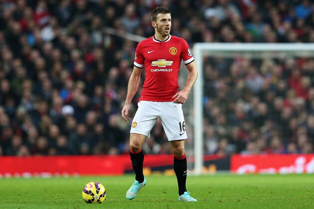 MANCHESTER, ENGLAND - NOVEMBER 29:  Michael Carrick of Manchester United in action during the Barclays Premier League match between Manchester United and Hull City at Old Trafford on November 29, 2014 in Manchester, England.  (Photo by Matthew Lewis/Getty Images)