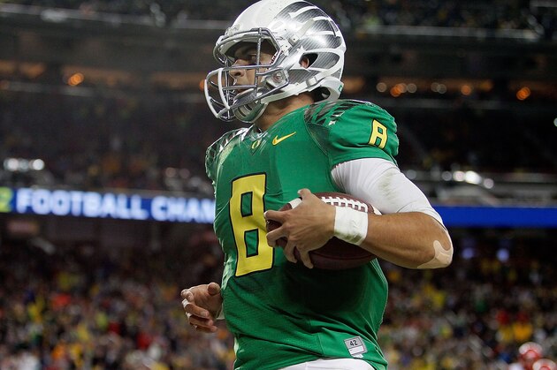 SANTA CLARA, CA - DECEMBER 05: Marcus Mariota #8 of the Oregon Ducks scrambles for a touchdown against the Arizona Wildcats during the first half of the PAC-12 Championships at Levi's Stadium on December 5, 2014 in Santa Clara, California. (Photo by Brian Bahr/Getty Images)