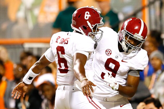 KNOXVILLE, TN - OCTOBER 25:  Amari Cooper #9 of the Alabama Crimson Tide reacts after pulling in a reception for a touchdown from Blake Sims #6 against the Tennessee Volunteers at Neyland Stadium on October 25, 2014 in Knoxville, Tennessee.  (Photo by Kevin C. Cox/Getty Images)