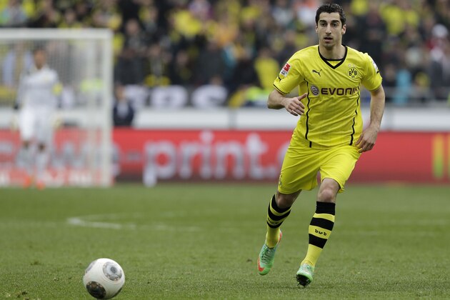 Dortmund's Henrikh Mkhitaryan of Armenia plays the ball during the German first division Bundesliga soccer match between Hannover 96 and  BvB Borussia Dortmund in Hannover, Germany, Saturday, March 22, 2014. (AP Photo/Markus Schreiber).