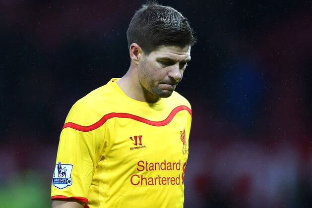 MANCHESTER, ENGLAND - DECEMBER 14:  Steven Gerrard of Liverpool shows his dejection at the end of the Barclays Premier League match between Manchester United and Liverpool at Old Trafford on December 14, 2014 in Manchester, England.  (Photo by Shaun Botterill/Getty Images)