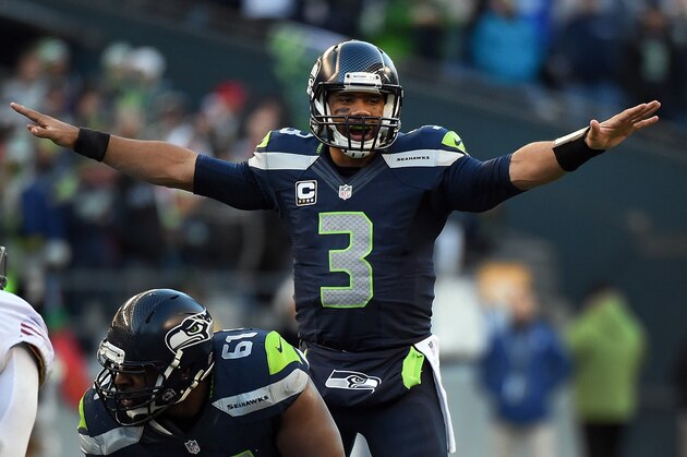 SEATTLE, WA - DECEMBER 14: Quarterback Russell Wilson #3 of the Seattle Seahawks calls out a play during the third quarter of the game against the San Francisco 49ers at CenturyLink Field on December 14, 2014 in Seattle, Washington. (Photo by Steve Dykes/Getty Images)