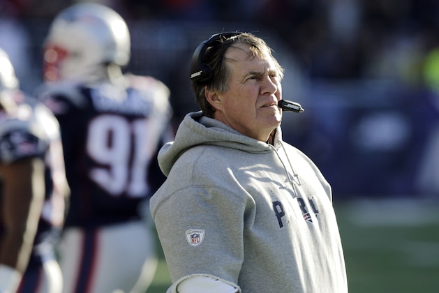 New England Patriots head coach Bill Belichick watches from the sideline in the first half of an NFL football game against the Miami Dolphins Sunday, Dec. 14, 2014, in Foxborough, Mass. (AP Photo/Charles Krupa)