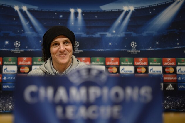 PSG's David Luiz, from Brazil, attends a press conference at the Camp Nou stadium in Barcelona, Spain, Tuesday, Dec. 9, 2014.  FC Barcelona will play against PSG in a group F Champions League on Wednesday. (AP Photo/Manu Fernandez)
