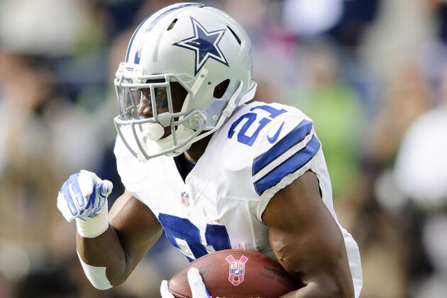 Oct 12, 2014; Seattle, WA, USA; Dallas Cowboys running back Joseph Randle (21) carries the ball against the Seattle Seahawks during the first half at CenturyLink Field. Dallas defeated Seattle 30-23. Mandatory Credit: Steven Bisig-USA TODAY Sports