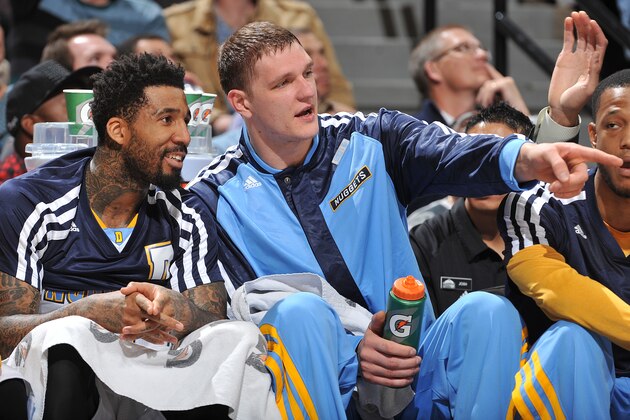 DENVER, CO - NOVEMBER 13:  Timofey Mozgov #25 and Wilson Chandler #21 of the Denver Nuggets talk during the game against the Los Angeles Lakers on November 13, 2013 at the Pepsi Center in Denver, Colorado. NOTE TO USER: User expressly acknowledges and agrees that, by downloading and/or using this Photograph, user is consenting to the terms and conditions of the Getty Images License Agreement. Mandatory Copyright Notice: Copyright 2013 NBAE (Photo by Garrett W. Ellwood/NBAE via Getty Images)