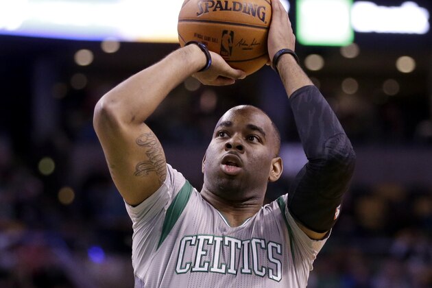 Boston Celtics guard Marcus Thornton takes a shot at the basket in the second quarter of an NBA basketball game against the Washington Wizards, Sunday, Dec. 7, 2014, in Boston. The Celtics won 101-93. (AP Photo/Steven Senne)