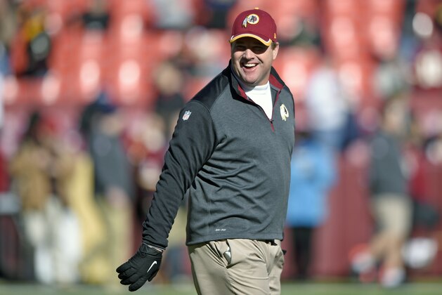Washington Redskins head coach Jay Gruden walks across the field before an NFL football game against the St. Louis Rams in Landover, Md., Sunday, Dec. 7, 2014. (AP Photo/Nick Wass)