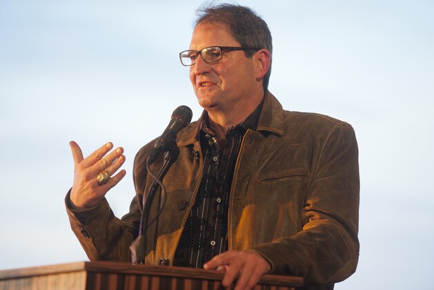Former Cleveland Browns quarterback, Bernie Kosar speaks to the crowd at the Hard Rock Rocksino Northfield Park Grand Opening, on Wednesday, Dec. 18, 2013 in Northfield, OH. (Photo by Jason Miller/Invision for Hard Rock International/AP Images)