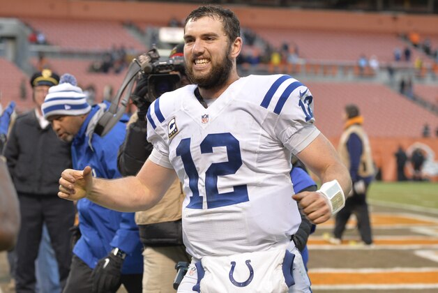 Indianapolis Colts quarterback Andrew Luck runs off the field after a 25-24 win over the Cleveland Browns in an NFL football game Sunday, Dec. 7, 2014, in Cleveland. (AP Photo/David Richard)