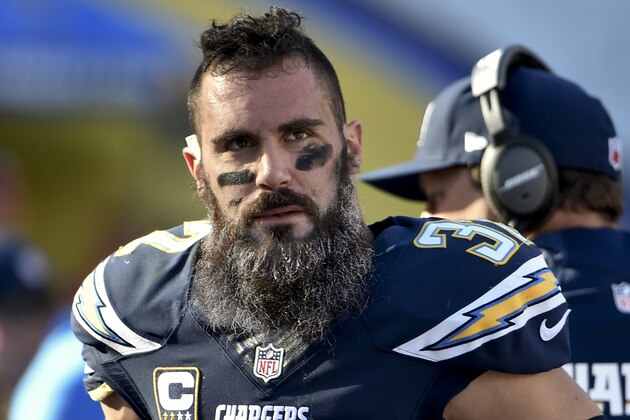 San Diego Chargers free safety Eric Weddle watches from the sidelines during the first half of an NFL football game against the Denver Broncos Sunday, Dec. 14, 2014, in San Diego.  (AP Photo/Denis Poroy)