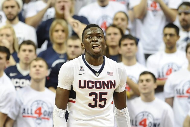 Connecticut’s Amida Brimah reacts during the first half of an NCAA college basketball game against Texas, Sunday, Nov. 30, 2014, in Storrs, Conn. (AP Photo/Jessica Hill)