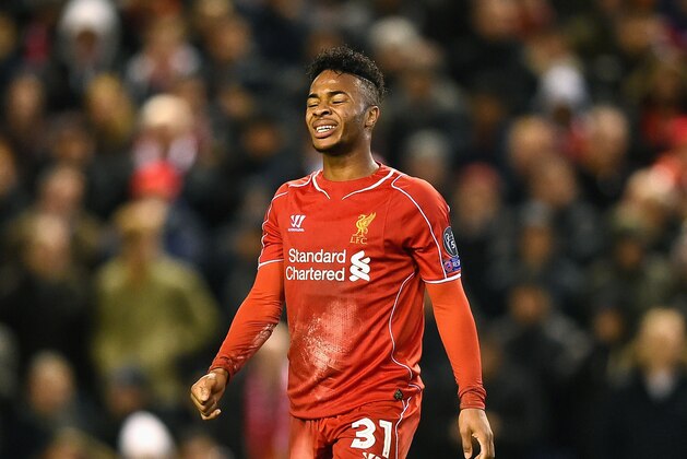 LIVERPOOL, ENGLAND - DECEMBER 09:  A dejected Raheem Sterling of Liverpool reacts following his team's 1-1 draw and exit from the competition during the UEFA Champions League group B match between Liverpool and FC Basel 1893 at Anfield on December 9, 2014 in Liverpool, United Kingdom.  (Photo by Laurence Griffiths/Getty Images)