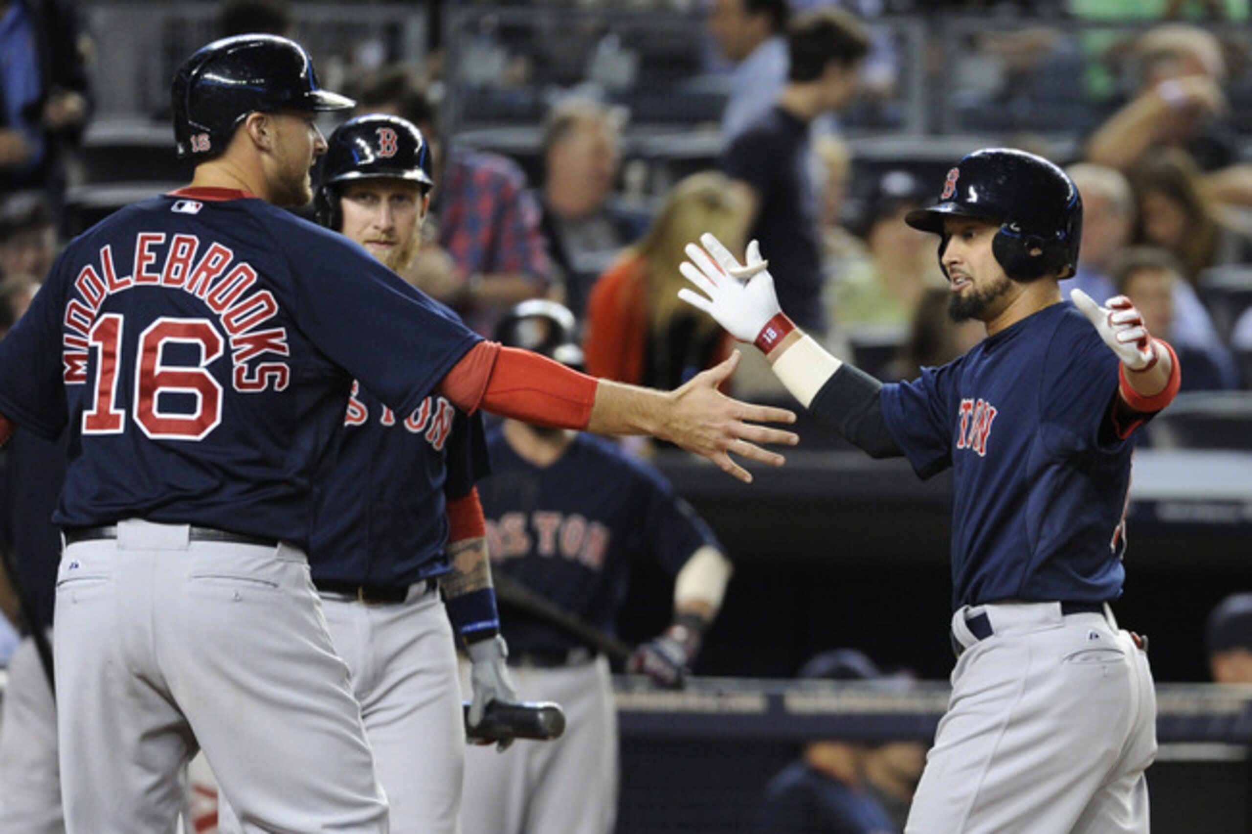 Boston Red Sox batter Shane Victorino, right, celebrates with Will Middlebrooks after Victorino hit a two-run home run during the eighth inning of a baseball game against the New York Yankees, Friday, Sept. 6, 2013, at Yankee Stadium in New York. (AP Photo/Bill Kostroun) Boston Red Sox batter Shane Victorino, right, celebrates with Will Middlebrooks after Victorino hit a two-run home run during the eighth inning of a baseball game against the New York Yankees, Friday, Sept. 6, 2013, at Yankee Stadium in New York. (AP Photo/Bill Kostroun)