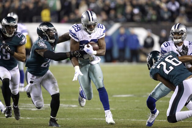 Dallas Cowboys' DeMarco Murray rushes during the second half of an NFL football game against the Philadelphia Eagles, Sunday, Dec. 14, 2014, in Philadelphia. (AP Photo/Michael Perez)
