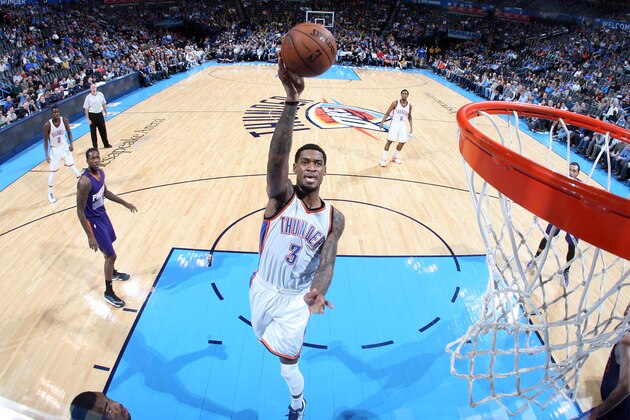OKLAHOMA CITY, OK- DECEMBER 14: Perry Jones #3 of the Oklahoma City Thunder goes up for a shot against the Phoeniz Suns on December 14, 2014 at Chesapeake Energy Arena in Oklahoma City, OK. NOTE TO USER: User expressly acknowledges and agrees that, by downloading and or using this photograph, User is consenting to the terms and conditions of the Getty Images License Agreement. Mandatory Copyright Notice: Copyright 2014 NBAE (Photo by Layne Murdoch/NBAE via Getty Images)