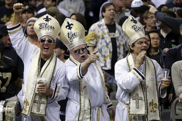 New Orleans Saints fans cheer in the first half of an NFL football game aCarolina Panthers in New Orleans, Sunday, Dec. 7, 2014. (AP Photo/Bill Feig) New Orleans Saints fans cheer in the first half of an NFL football game aCarolina Panthers in New Orleans, Sunday, Dec. 7, 2014. (AP Photo/Bill Feig)
