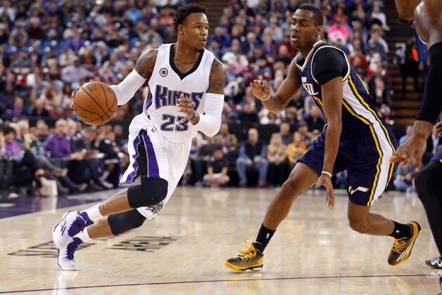Dec 8, 2014; Sacramento, CA, USA; Sacramento Kings guard Ben McLemore (23) drives in against Utah Jazz guard Alec Burks (10) during the first quarter at Sleep Train Arena. Mandatory Credit: Kelley L Cox-USA TODAY Sports