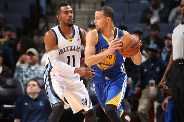 MEMPHIS, TN - DECEMBER 7: Stephen Curry #30 of the Golden State Warriors controls the ball against Mike Conley #11 of the Memphis Grizzlies on December 7, 2013 at FedExForum in Memphis, Tennessee. NOTE TO USER: User expressly acknowledges and agrees that, by downloading and or using this photograph, User is consenting to the terms and conditions of the Getty Images License Agreement. Mandatory Copyright Notice: Copyright 2013 NBAE (Photo by Joe Murphy/NBAE via Getty Images)