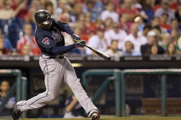 PHILADELPHIA, PA - SEPTEMBER 27: Left fielder Justin Upton #8 of the Atlanta Braves hits a two run home run in the top of the seventh inning against the Philadelphia Phillies on September 27, 2014 at Citizens Bank Park in Philadelphia, Pennsylvania. The Braves defeated the Phillies 4-2. (Photo by Mitchell Leff/Getty Images)