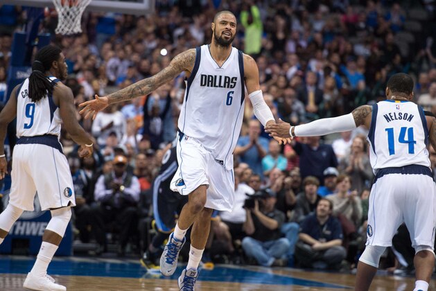 Dec 13, 2014; Dallas, TX, USA; Dallas Mavericks forward Jae Crowder (9) and center Tyson Chandler (6) and guard Jameer Nelson (14) celebrate during the second half against the Golden State Warriors at the American Airlines Center. The Warriors defeated the Mavericks 105-98. Mandatory Credit: Jerome Miron-USA TODAY Sports