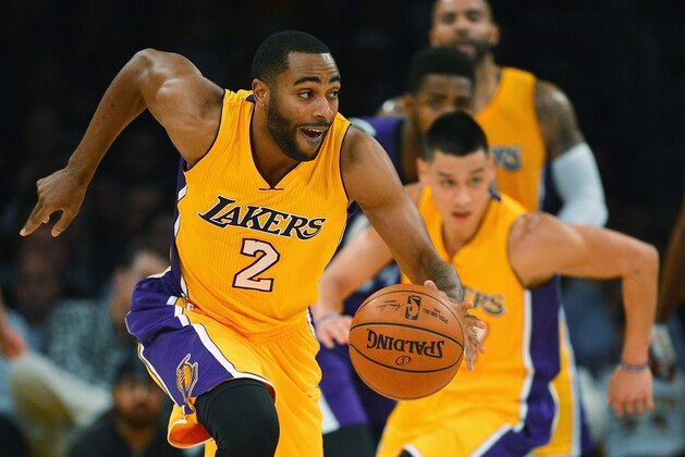 LOS ANGELES, CA - DECEMBER 09:  Wayne Ellington #2 of the Los Angeles Lakers moves the ball upcourt during a game against the Sacramento Kings at Staples Center on December 9, 2014 in Los Angeles, California.   NOTE TO USER: User expressly acknowledges and agrees that, by downloading and or using this photograph, User is consenting to the terms and conditions of the Getty Images License Agreement.  (Photo by Jonathan Moore/Getty Images)