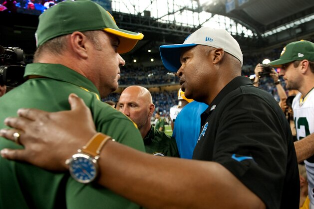 Sep 21, 2014; Detroit, MI, USA; Detroit Lions head coach Jim Caldwell and Green Bay Packers head coach Mike McCarthy after the game at Ford Field. Detroit won 19-7. Mandatory Credit: Tim Fuller-USA TODAY Sports