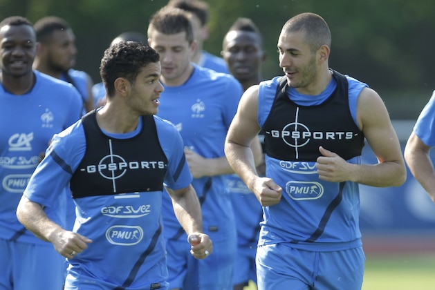 French national soccer forwards players, Hatem Ben Arfa, left, and Karim Benzema, right, chat during a training session in Clairefontaine near Paris, Thursday, May 24, 2012. France will play Iceland on Sunday. (AP Photo/Thibault Camus) French national soccer forwards players, Hatem Ben Arfa, left, and Karim Benzema, right, chat during a training session in Clairefontaine near Paris, Thursday, May 24, 2012. France will play Iceland on Sunday. (AP Photo/Thibault Camus)