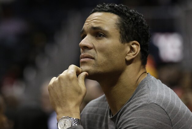 Atalanta Falcons tight end Tony Gonzalez watches an NBA  basketball game between Atlanta Hawks and Los Angeles Lakers Monday, Dec. 16, 2013, in Atlanta. (AP Photo/John Bazemore)  ll ah
