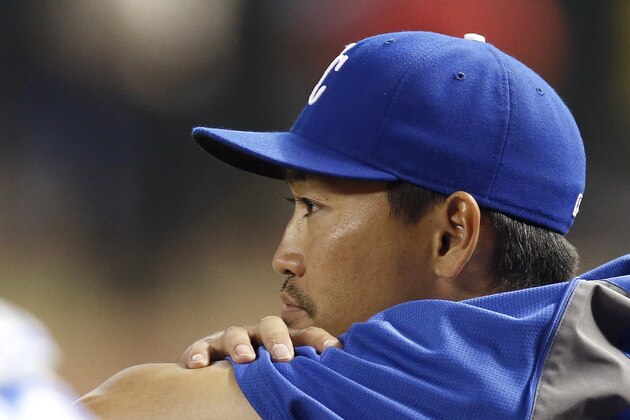 Kansas City Royals' Nori Aoki, of Japan, sits in the dugout during the ninth inning of a baseball game against the Arizona Diamondbacks on Wednesday, Aug. 6, 2014, in Phoenix.  The Royals defeated the Diamondbacks 4-3. (AP Photo/Ross D. Franklin)