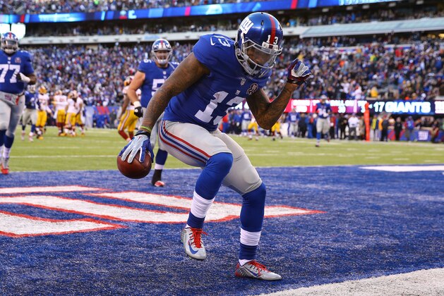 EAST RUTHERFORD, NJ - DECEMBER 14:  Odell Beckham Jr. #13 of the New York Giants celebrates after an attempted 30 yard touchdown that was nullified due to a penalty in the fourth quarter during their game against the Washington Redskins at MetLife Stadium on December 14, 2014 in East Rutherford, New Jersey.  (Photo by Al Bello/Getty Images)