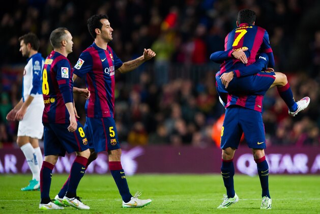 BARCELONA, SPAIN - DECEMBER 07: Pedro Rodriguez (R) of FC Barcelona celebrates with his teammates Andres Iniesta (L) and Sergio Busquets (2nd L) after scoring his team's fourth goal during the La Liga match between FC Barcelona and RCD Espanyol at Camp Nou on December 7, 2014 in Barcelona, Spain. (Photo by Alex Caparros/Getty Images) BARCELONA, SPAIN - DECEMBER 07: Pedro Rodriguez (R) of FC Barcelona celebrates with his teammates Andres Iniesta (L) and Sergio Busquets (2nd L) after scoring his team's fourth goal during the La Liga match between FC Barcelona and RCD Espanyol at Camp Nou on December 7, 2014 in Barcelona, Spain. (Photo by Alex Caparros/Getty Images)