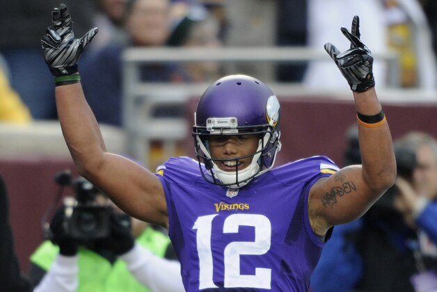 MINNEAPOLIS, MN - NOVEMBER 23: Charles Johnson #12 of the Minnesota Vikings celebrates scoring a touchdown against the Green Bay Packers during the second quarter of the game on November 23, 2014 at TCF Bank Stadium in Minneapolis, Minnesota. (Photo by Hannah Foslien/Getty Images)