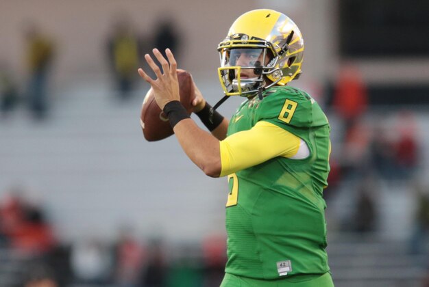 Nov 29, 2014; Corvallis, OR, USA; Oregon Ducks quarterback Marcus Mariota (8) warms up before the game against the Oregon State Beavers at Reser Stadium. Mandatory Credit: Scott Olmos-USA TODAY Sports
