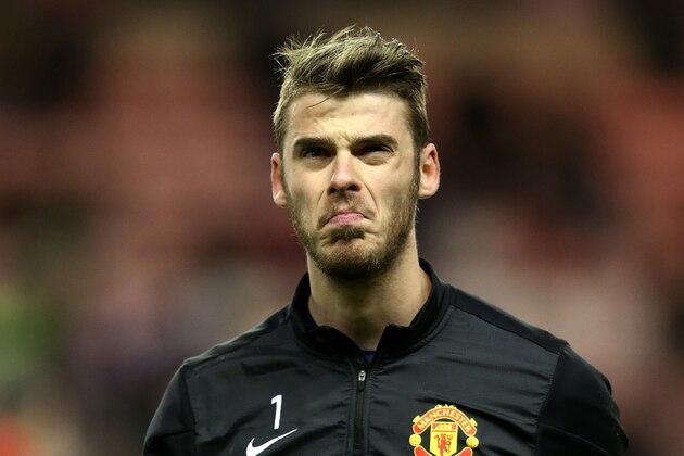Manchester United's goalkeeper David de Gea warms up ahead of their English League Cup semifinal first leg soccer match against Sunderland at the Stadium of Light, Sunderland, England, Tuesday, Jan. 7, 2014. (AP Photo/Scott Heppell)