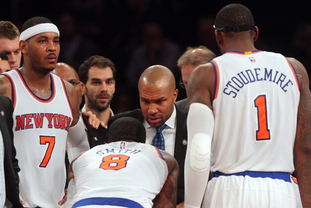 Nov 10, 2014; New York, NY, USA; New York Knicks head coach Derek Fisher coaches New York Knicks small forward Carmelo Anthony (7) and New York Knicks shooting guard J.R. Smith (8) and New York Knicks power forward Amar'e Stoudemire (1) against the Atlanta Hawks during the fourth quarter at Madison Square Garden. The Hawks defeated the Knicks 91-85. Mandatory Credit: Brad Penner-USA TODAY Sports