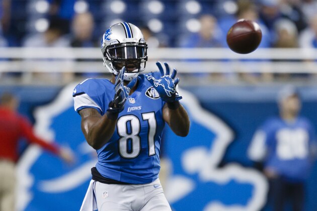 Detroit Lions wide receiver Calvin Johnson (81) makes a catch during warm ups before an NFL football game against the Minnesota Vikings at Ford Field in Detroit, Sunday, Dec. 14, 2014. (AP Photo/Rick Osentoski)