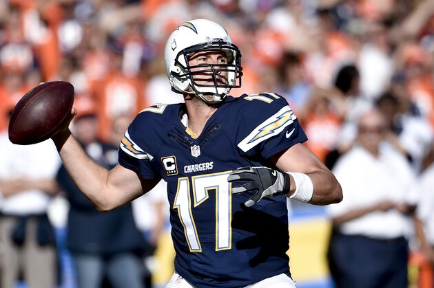 San Diego Chargers quarterback Philip Rivers throws against the Denver Broncos during the first half of an NFL football game Sunday, Dec. 14, 2014, in San Diego. (AP Photo/Denis Poroy)