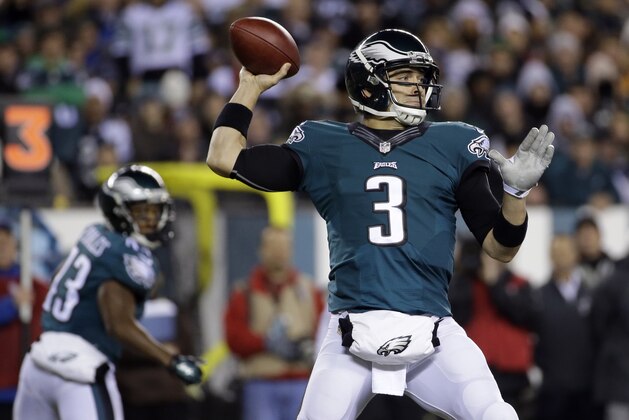 Philadelphia Eagles' Mark Sanchez passes during the first half of an NFL football game against the Dallas Cowboys, Sunday, Dec. 14, 2014, in Philadelphia. (AP Photo/Michael Perez)