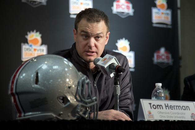 FILE - In this Jan. 3, 2014, file photo, Ohio State offensive coordinator Tom Herman talks to the media during an NCAA college football news conference in Fort Lauderdale, Fla. Herman was named the winner of the Broyles Award on Tuesday, Dec. 9, 2014, after the Buckeyes made the College Football Playoff despite losing two starting quarterbacks to season-ending injuries. (AP Photo/J Pat Carter, File)