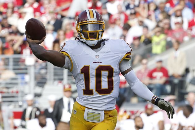 Washington Redskins quarterback Robert Griffin III (10) passes against the San Francisco 49ers during the second quarter of an NFL football game in Santa Clara, Calif., Sunday, Nov. 23, 2014. (AP Photo/Tony Avelar)