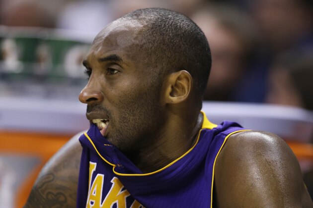 Los Angeles Lakers' Kobe Bryant watches from the bench during the second half of an NBA basketball game against the Indiana Pacers, Monday, Dec. 15, 2014, in Indianapolis. The Pacers won 110-91. (AP Photo/Darron Cummings) Los Angeles Lakers' Kobe Bryant watches from the bench during the second half of an NBA basketball game against the Indiana Pacers, Monday, Dec. 15, 2014, in Indianapolis. The Pacers won 110-91. (AP Photo/Darron Cummings)
